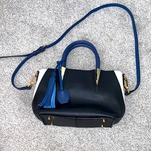 Black white and blue leather bag